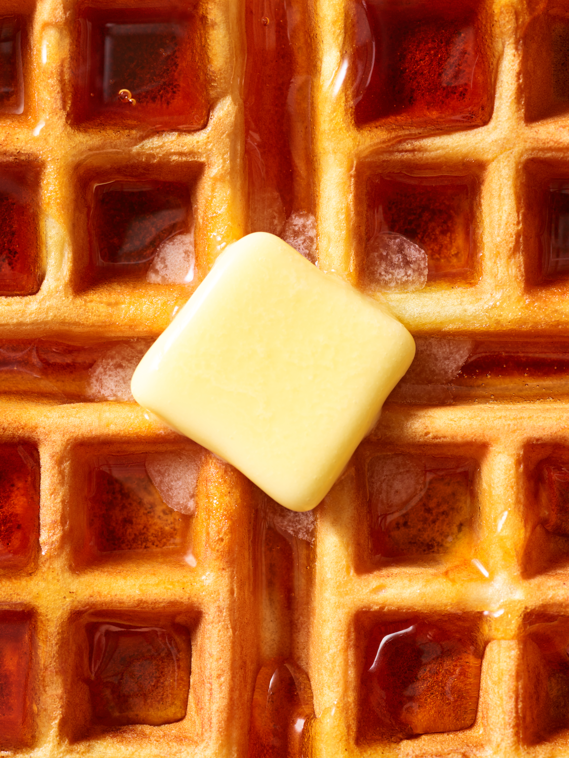 Graphic modern breakfast image of melting butter on a waffle image by Los Angeles commercial food and product photographer Vinnie Finn | SternRep