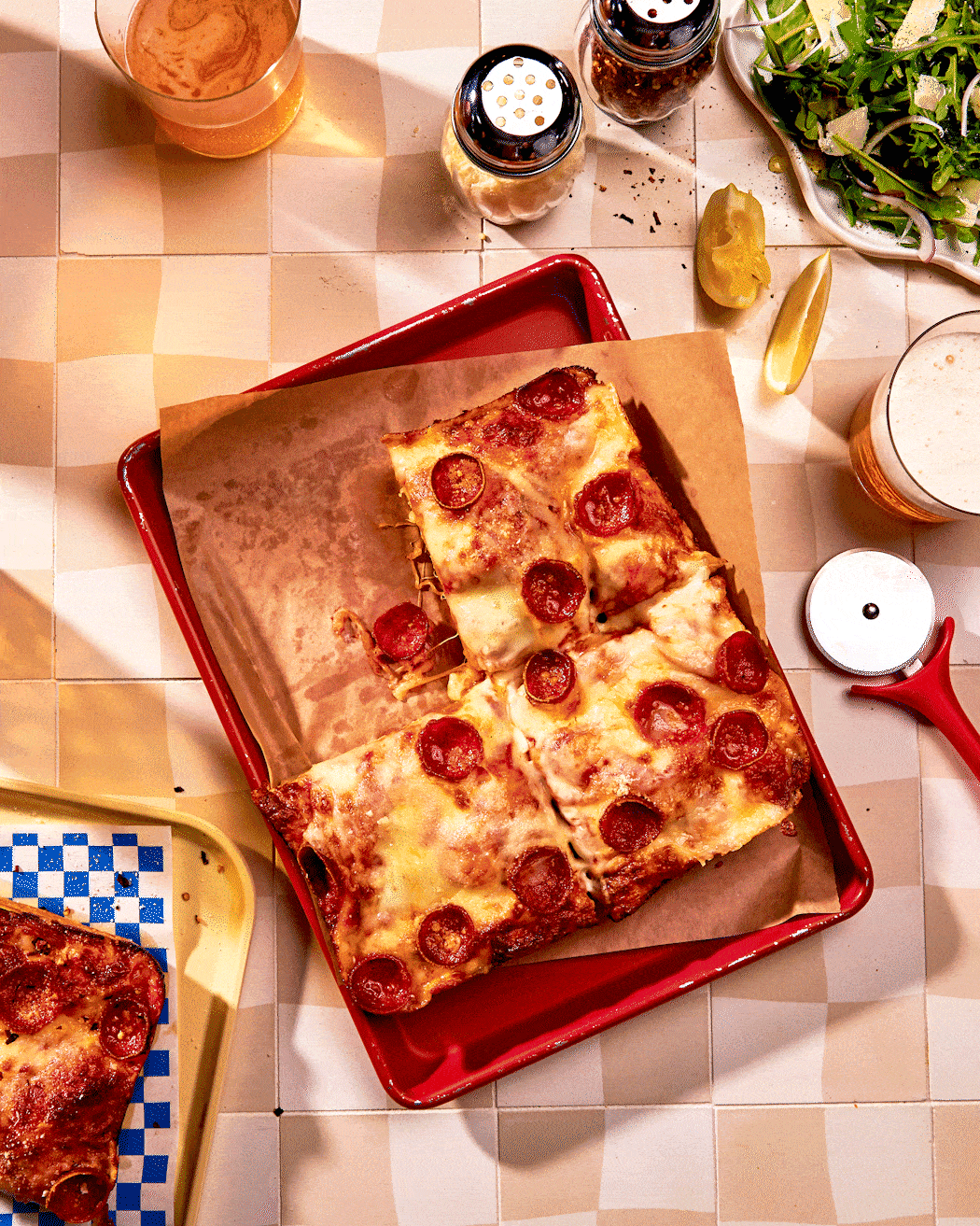 pizza pulling away by los angeles food photographer maddie eickhoff